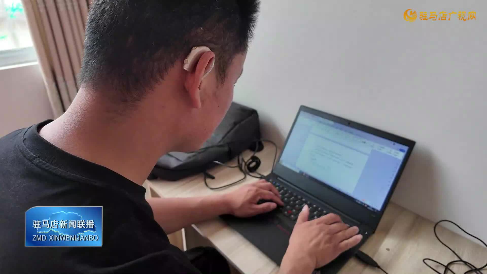 杨运祥:失聪不失志 以手中之笔传自强精神